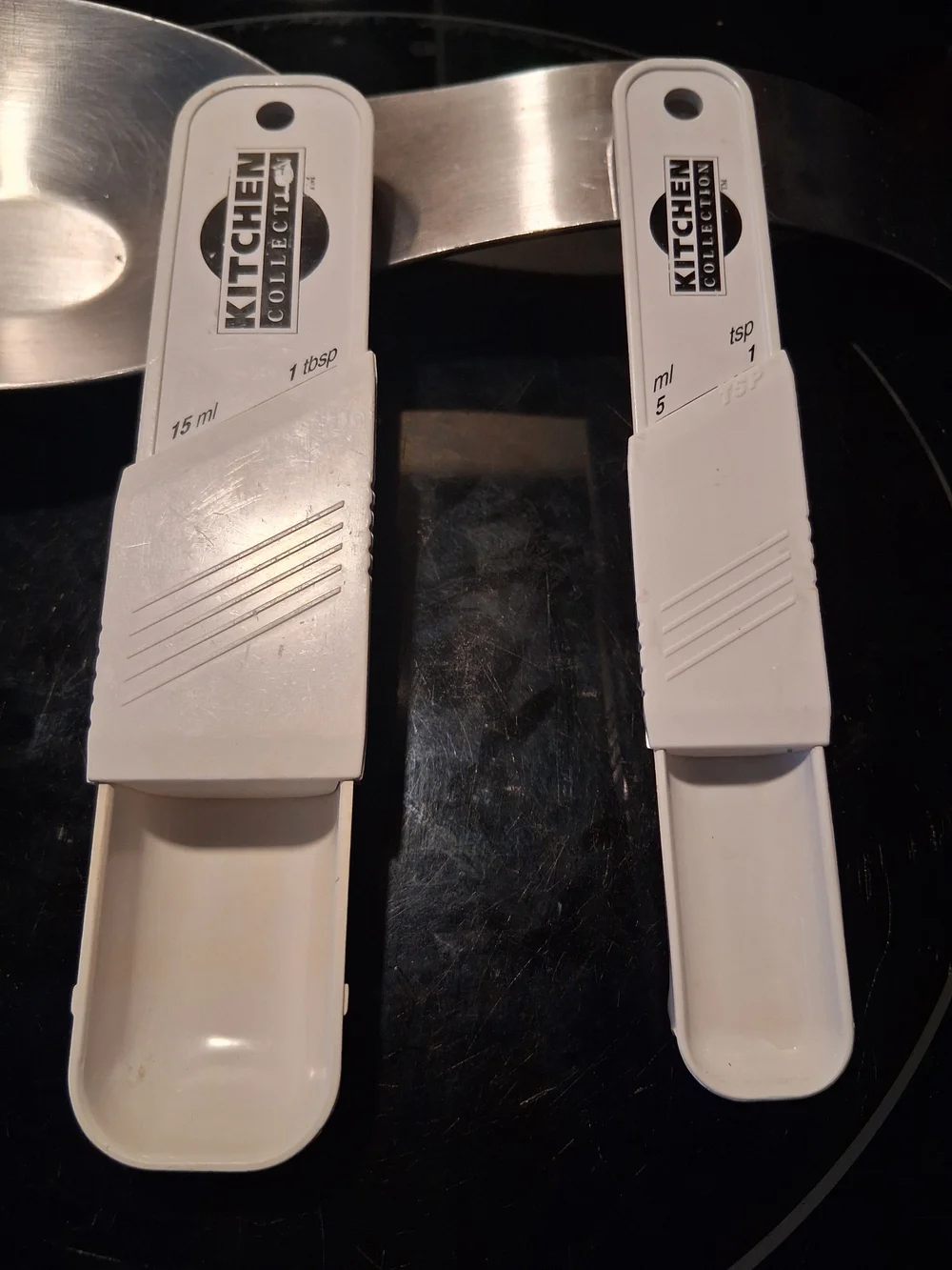 Plastic Kitchen Collection Adjustable Measuring Spoon. 1/8-1tsp &1tdp-1Tbsp.